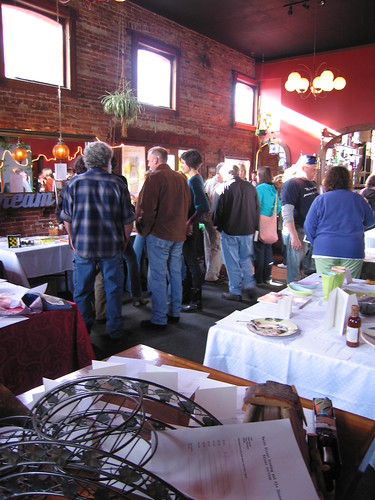 The crowd milling about the auction tables.