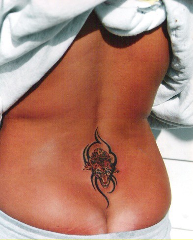 sexy sunbather tattoo · tribal / leopard tattoo 