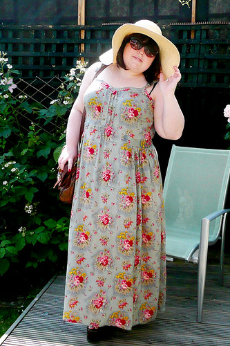 I am wearing a long khaki and red floral dress brown platform wedge sandals