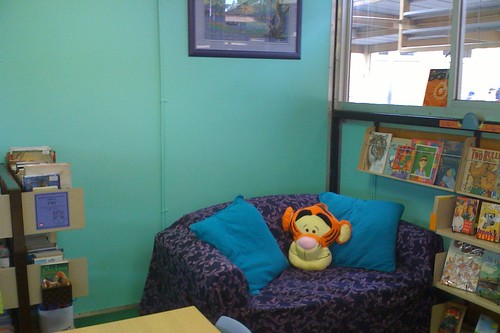purple couch, Tigger, green wall