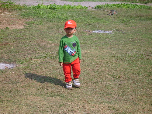 orange pants and cap