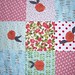 knit rose quilt top