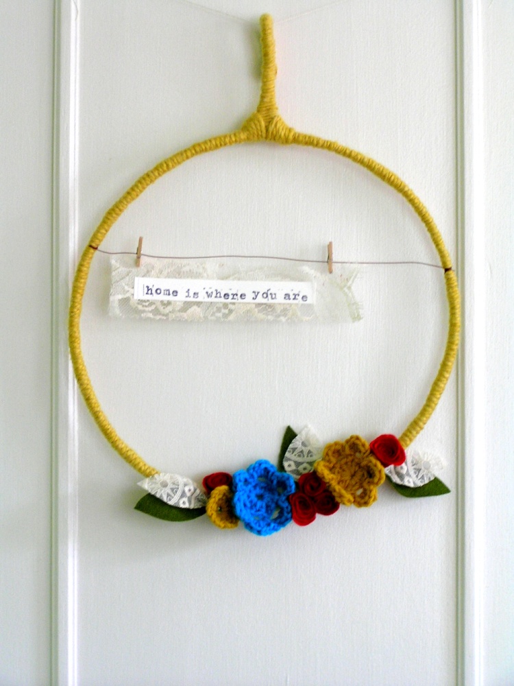 home is where you are - yarn wreath in mustard, red, turquoise, and ivory