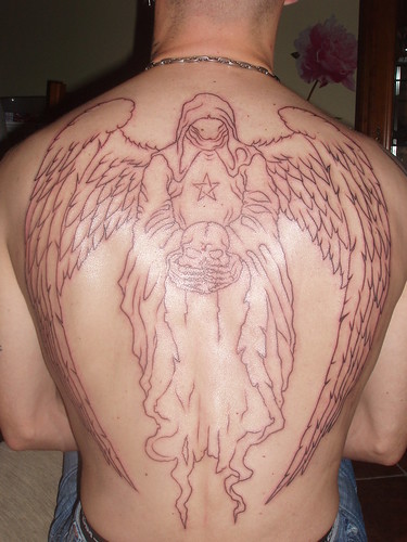 women tribal tattoos on back. Tattoo is woman angel Back