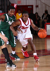Malik Boothe driving against South Florida player