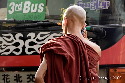 monk with a mobile phone