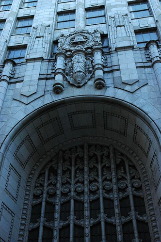 It reads "Bell System"; Details of the art deco building, Ma Bell, art deco archway, San Francisco, California, USA by Wonderlane