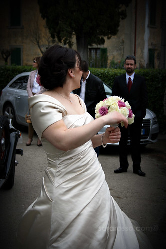 The bride's dress in a wedding in Tuscany The bouquet is one of my favorite