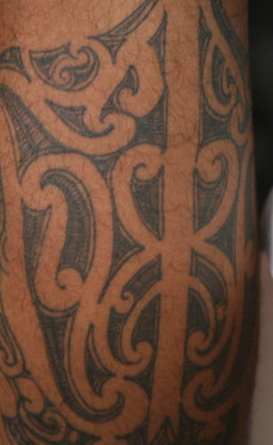 cross tattoos on calf. muscle tattoo. tattoo calf