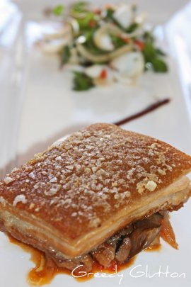 Crispy Corn-fed Pork Belly with braised tomato & eggplant, grilled cuttlefish, cress salad and capsicum oil