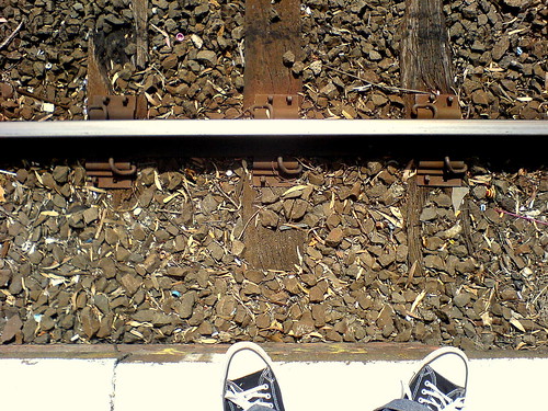 Waiting for a train at a lonely railway station in Melbourne