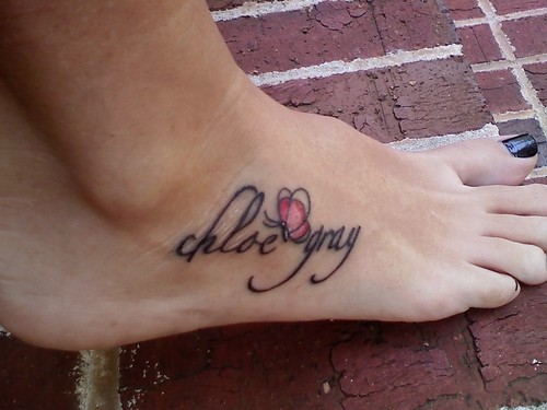 foot tattoos words