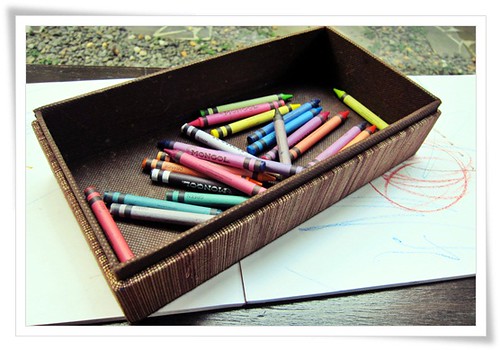 A tissue box for the crayons.