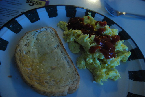 Scrambled eggs and rye toast
