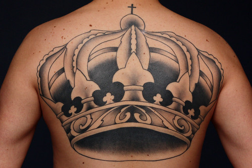 crown tattoo with word tattoo design on foot mens tattoos
