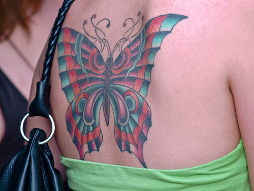 colorful butterfly tattoo. utterfly tattoo