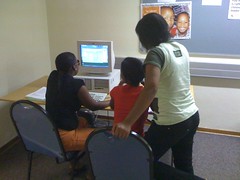 Students using a computer in the Lobatse library by James BonTempo