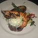 Filet topped with roasted Garlic butter and a grilled prawn