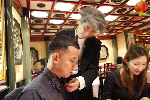 Prof Ando teaching Ming Jin how to wear his (Prof Ando's) bow tie