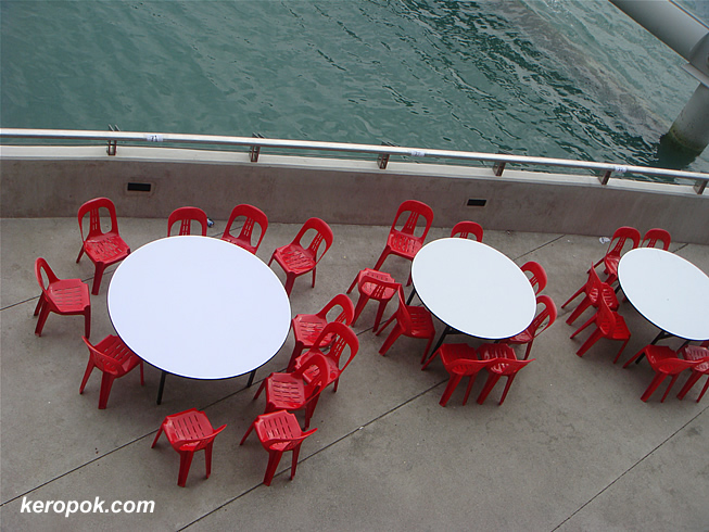 Red chairs and empty tables