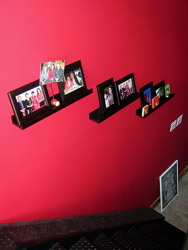 red wall with photos