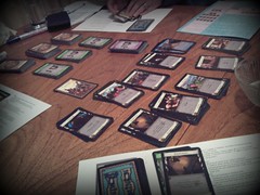 Photograph of a game of Dominion in progress