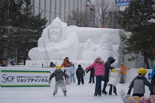 ice skaters and snow sculpture