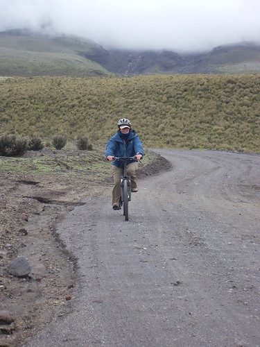 Kathy biking down the Volcano