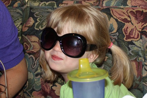 Catie at Mother's Day brunch, trying on Tracy's sunglasses