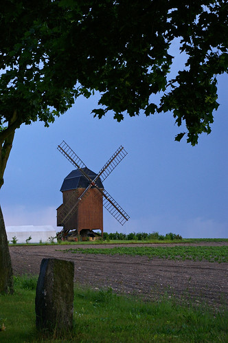Windmill with storm clouds behind...