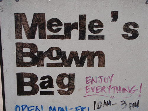 Merle's Brown Bag Off Season Sign