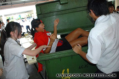 One of ACJC students common hobby - dumping classmates into waste bins