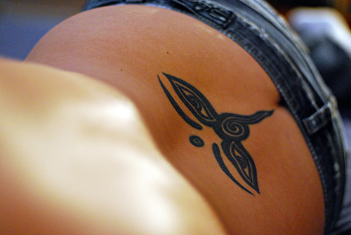 The Lower Back Tattoos of Butterflies Makes a Woman Gorgeous