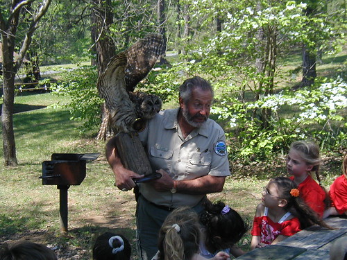 Dr. Jim Jordan with a barred owl mount at Holliday Lake State Park