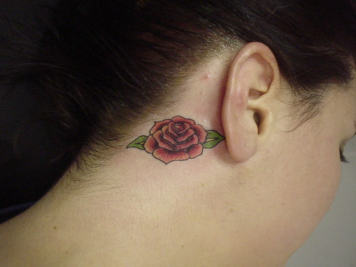 Sexy Girl Tattoo With Rose Tattoo On Neck