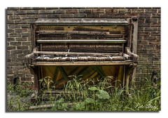 Piano ............. one careless owner.