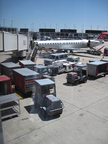 Luggage being loaded onto an airplane