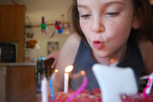 blowing out her candles