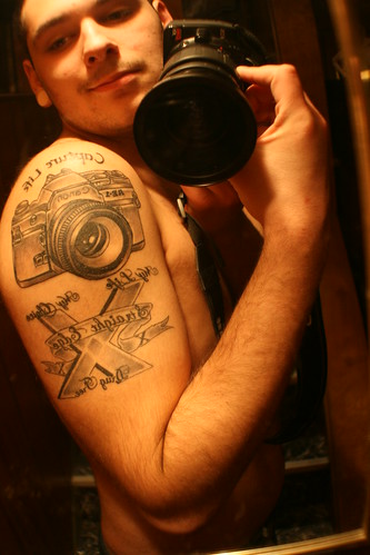 edge tattoo. camera ,straight edge tattoo