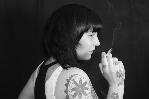 smokeing tattooed babe