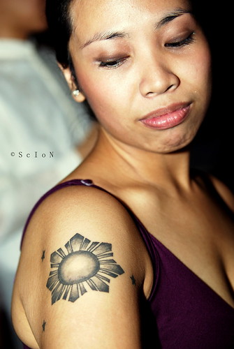 filipino tattoo star A shot on Cholle with her 3 stars and the sun tattoo