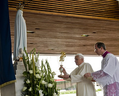 Pope Benedict XVI prays in front of the image ...