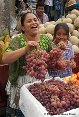 Grape seller, market, Cobán, Guatemala
