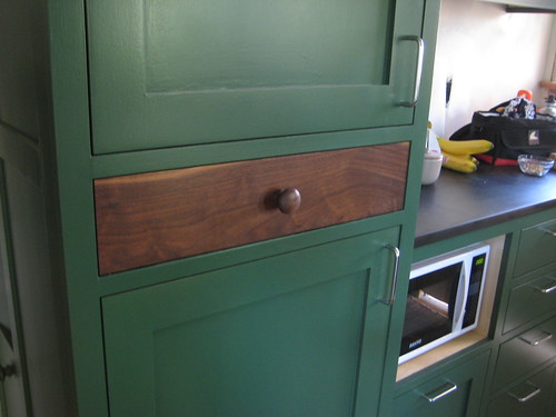 pantry drawer with walnut face