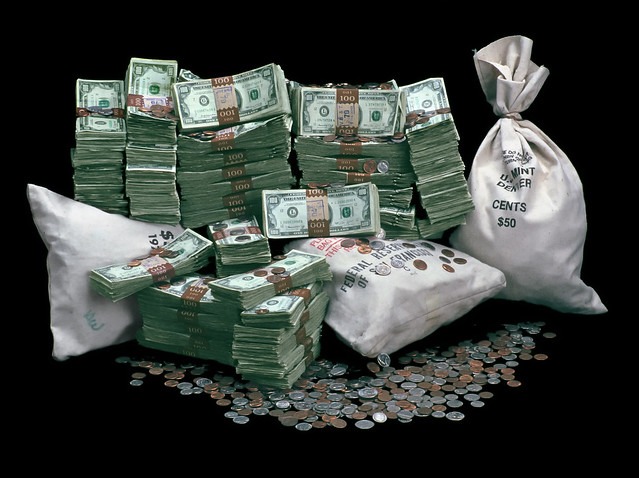 Piles of Money and Money Bags