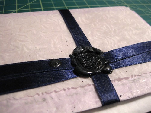 Ribbon and wax seal, inside envelope closeup