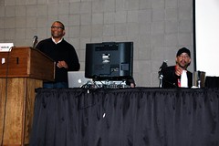 (l to r) Reggie Hudlin and Denys Cowan, with Jim McCann hiding behind the monitor