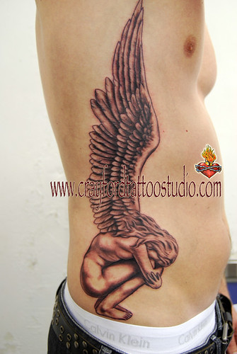 Crouching Angel Tattoo Tattooed by 