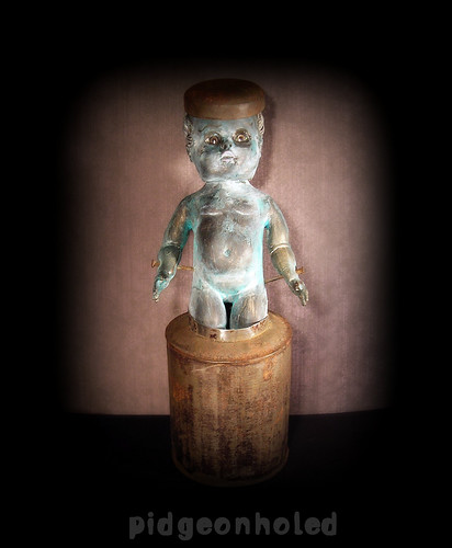 "pidgeonholed" art doll assemblage