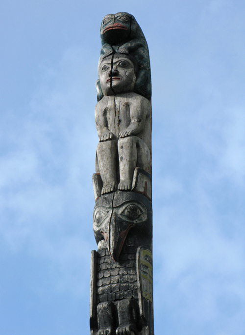 the top figures of a totem pole, downtown Juneau, Alaska